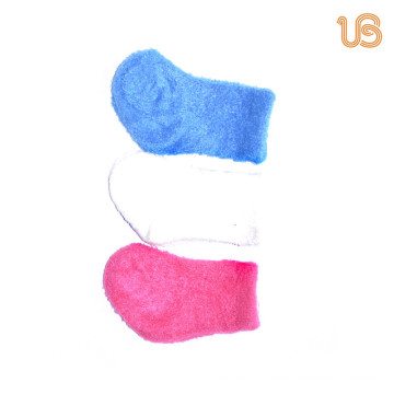 Chaussette duveteuse de couleur unie pour bébé